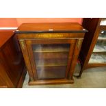 A Victorian inlaid walnut pier cabinet