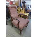 An early Victorian rosewood and upholstered open armchair