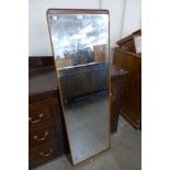 A teak framed mirror