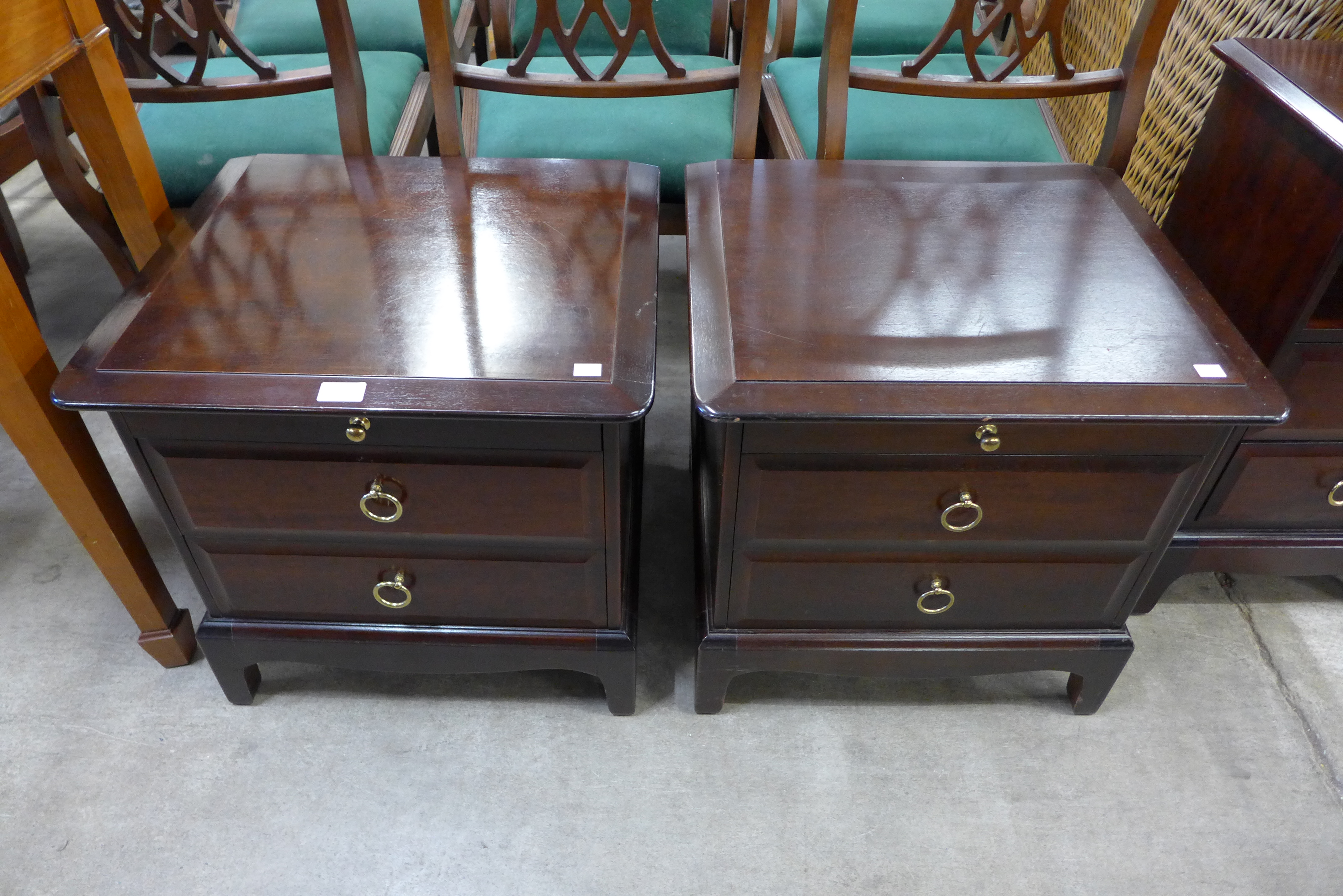 A pair of Stag Minstrel mahogany bedside chests