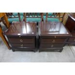 A pair of Stag Minstrel mahogany bedside chests