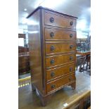 A small Bevan & Funnell walnut chest of drawers