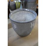 A galvanised dolly tub