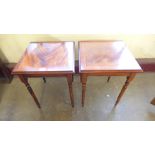 A pair of inlaid mahogany occasional tables