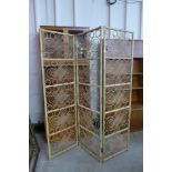 A bamboo and wicker three panel folding screen