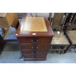 A mahogany and leather topped two drawer filing cabinet