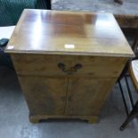 A mahogany record cabinet, three mahogany tripod tables and three mahogany chairs