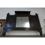 An early 20th Century carved oak hall mirror