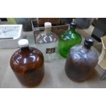 Four glass carboys