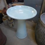 A Laura Ashley turquoise glazed terracotta bird bath