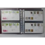 A collection of eighty-four stamp First Day Covers in a Royal Mail album, 1989-2002