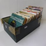 A box of 1960's The Beatles, The Who and rhythm and blues 7" vinyl singles
