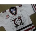 A signed Red Dear Rebels ice hockey shirt
