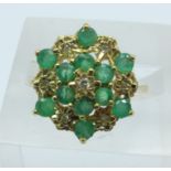 A 9ct gold emerald and diamond cluster ring, 3.0g, Q