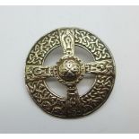 An Iona Celtic cross silver brooch designed by Alexander Ritchie