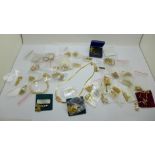 A collection of gold plated jewellery set with gemstones