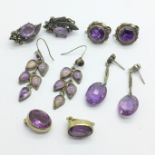 Five pairs of silver earrings, including amethyst