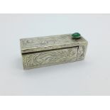 A silver combination lipstick holder with mirror and cabochon green stone, 20g