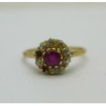 A yellow metal, diamond and ruby ring, two stones missing, 2.0g, M