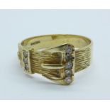 A 9ct gold buckle ring, 3.7g, T
