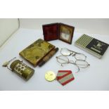 A Japanese cigarette case, a brass scent bottle, spectacles, a Russian medal, etc.