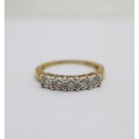 A 9ct gold and diamond ring, 2.2g, P, 0.15 carat weight