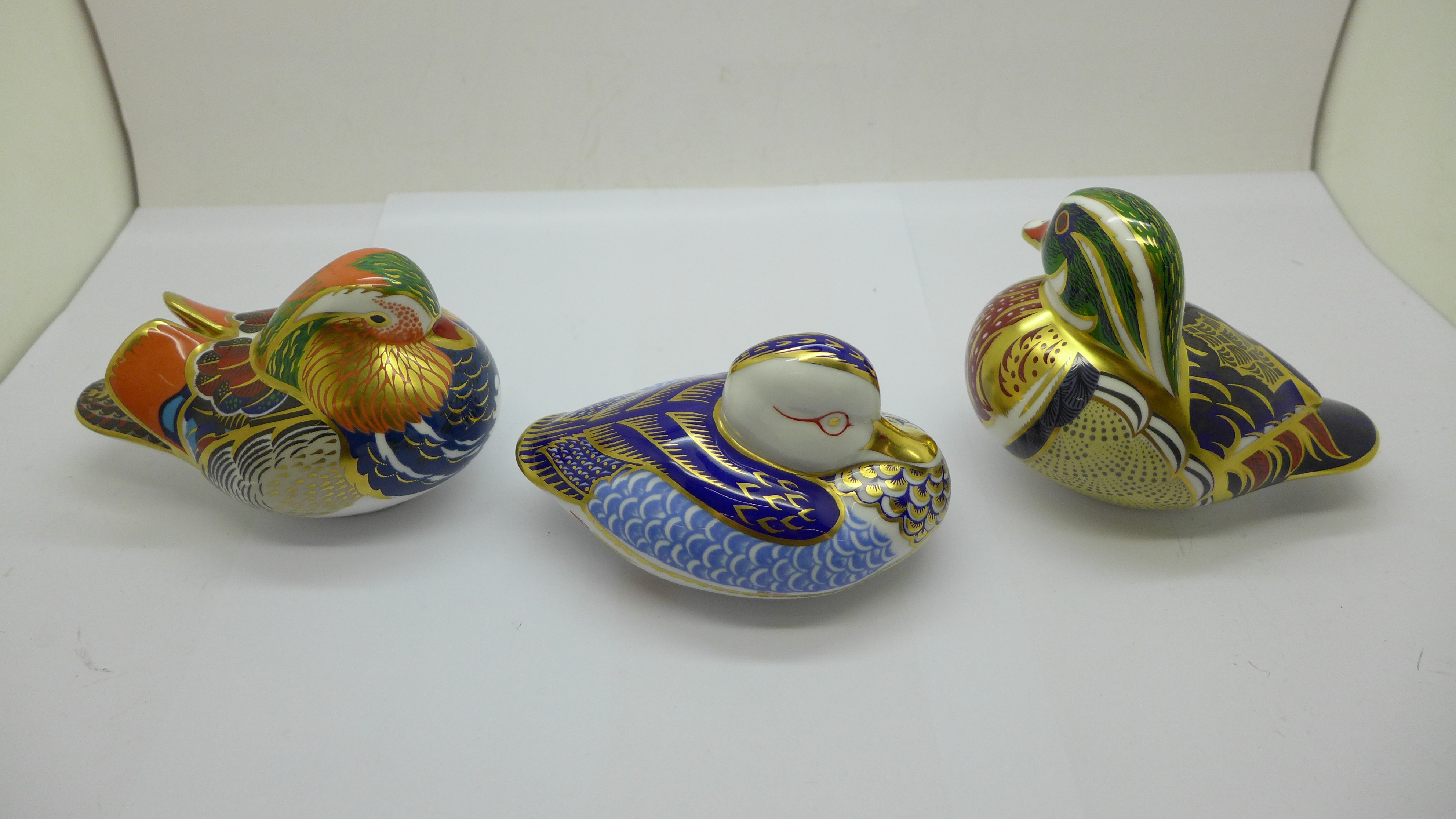 Three Royal Crown Derby paperweights; Mandarin Duck with gold stopper and original box, Carolina - Image 2 of 3