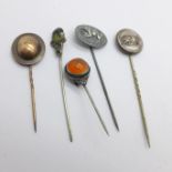 Five stick pins including Memorable Order of Tin Hats stickpins