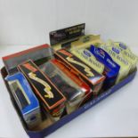 Eleven die-cast model vehicles, boxed