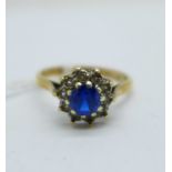 A 9ct gold, blue and white stone cluster ring, 2.6g, O