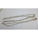 A 9ct gold and rock crystal flapper style necklace, 156cm approximate, 37.5g