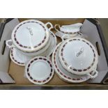 A Paragon Elegance dinner service including six dinner plates, dessert plates, side plates, one meat