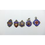 Five silver and enamel fobs, 56g