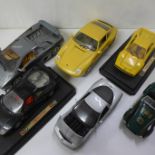 Eight 1 1/18th scale model vehicles