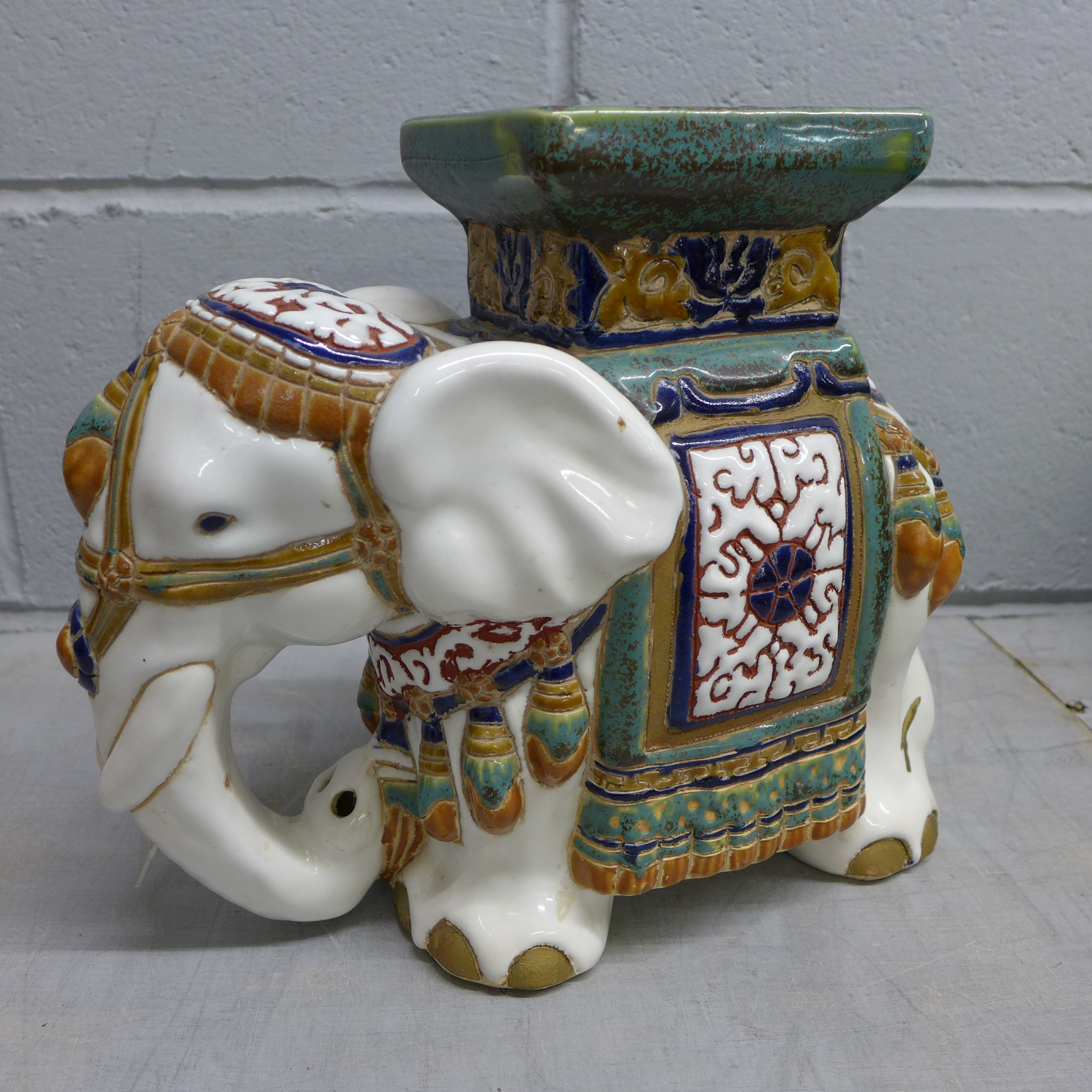 A ceramic elephant seat
