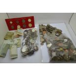 A collection of coins and bank notes
