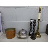 Three copper saucepans, plated muffin dish, a pair and one single candlestick