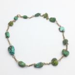 A 9ct gold and turquoise necklace