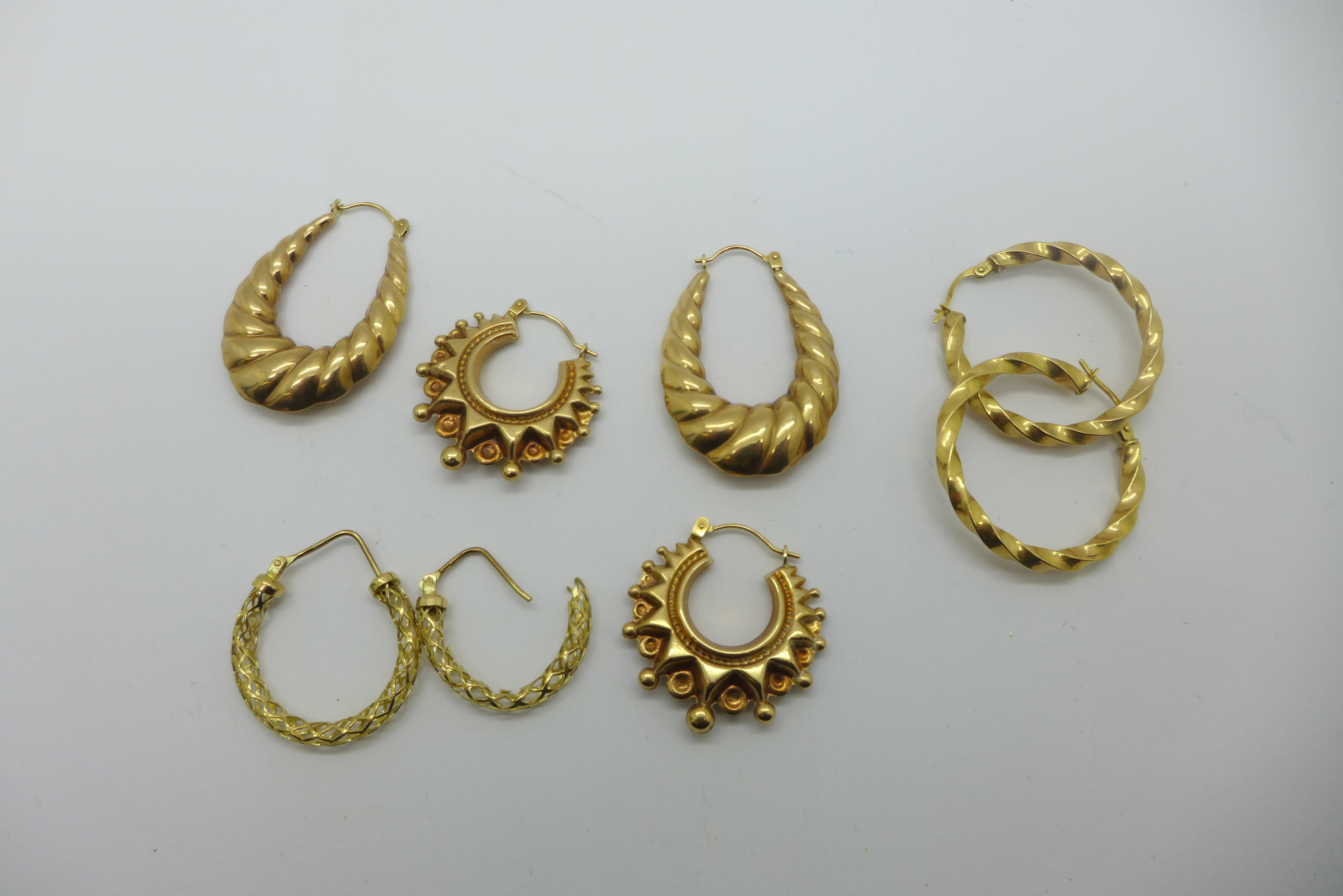 Four pairs of 9ct gold earrings, 9.1g, one pair a/f