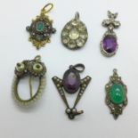 Six pendants, including silver