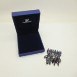 A Swarovski brooch, boxed