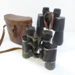 Two pairs of binoculars, Prinz 12x50, and one other pair, cased