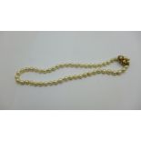 A pearl necklet with 9ct gold clasp, one pearl missing
