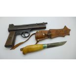 A Webley Air Pistol Mark I., .177 and a dagger with scabbard, the blade marked Jutland