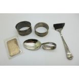 Two silver napkin rings and a plated baby feeding set
