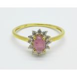 A silver gilt cabochon ruby and zircon cluster ring, S
