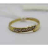 A 9ct gold and diamond ring, 0.8g, O