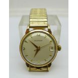 A 9ct gold Waltham wristwatch, case back with inscription