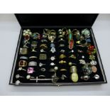 Approximately ninety costume rings, boxed