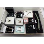 A collection of silver and silver mounted jewellery including turquoise and garnet